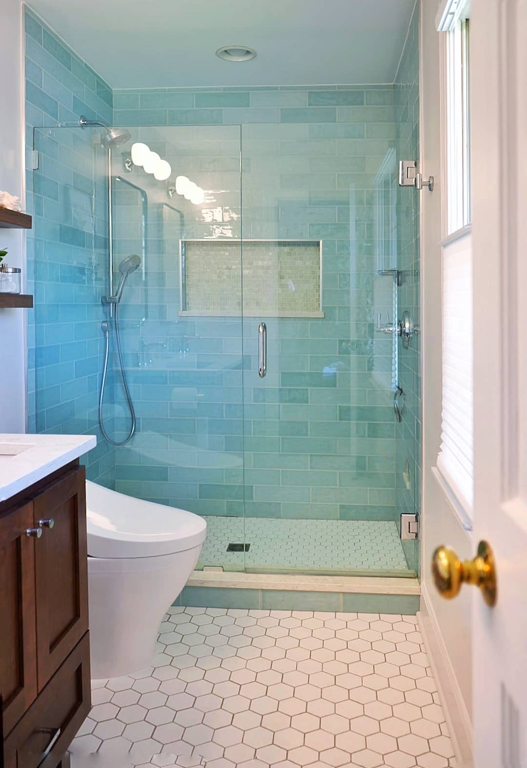 Modern master bathroom in Chapel Hill with a frameless glass shower and double vanity